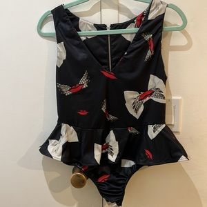 "Jazmin chebar" black satin bodysuit with ruffle - mouth & bows. Size 8 (42-44)